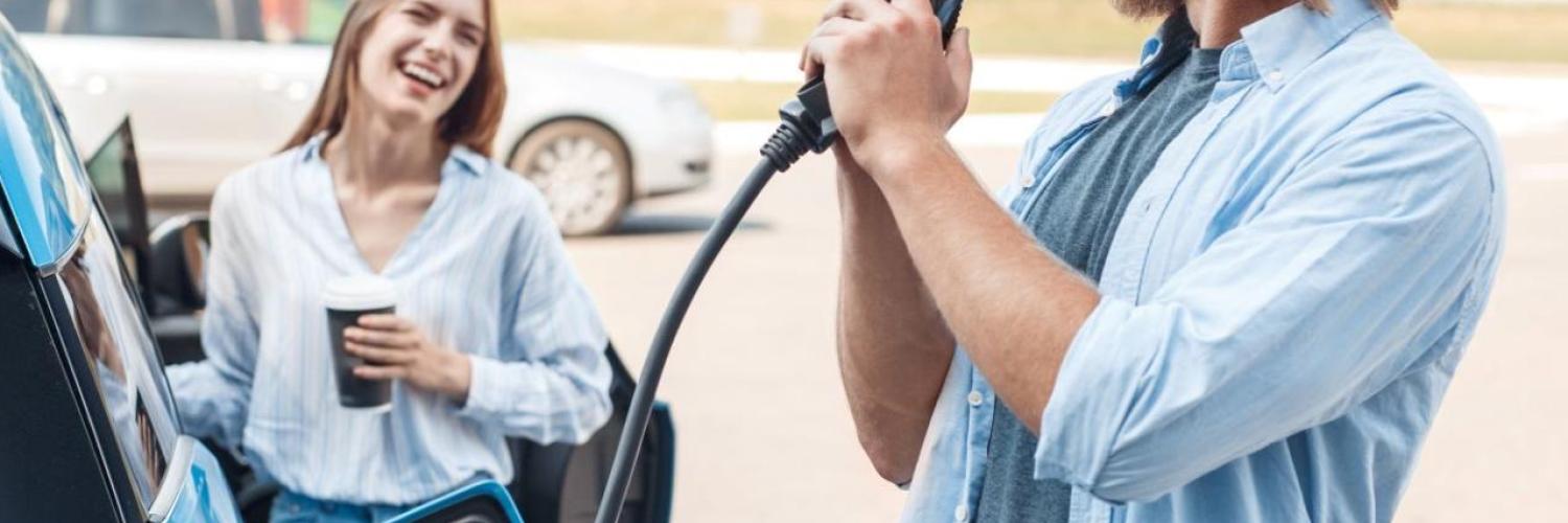Couple with electric car